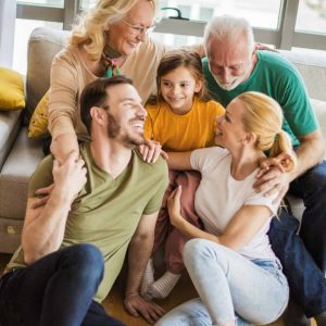 Our pride and joy. Portrait of three generations of family relaxing together at home.